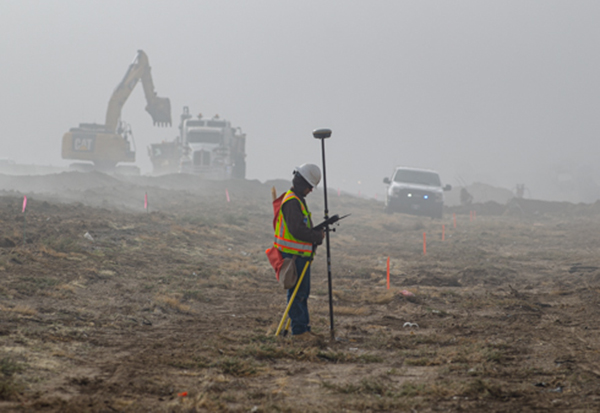 A picture of a worker completing a survey